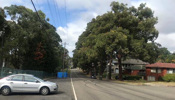 A car parked on the side of a road

Description automatically generated